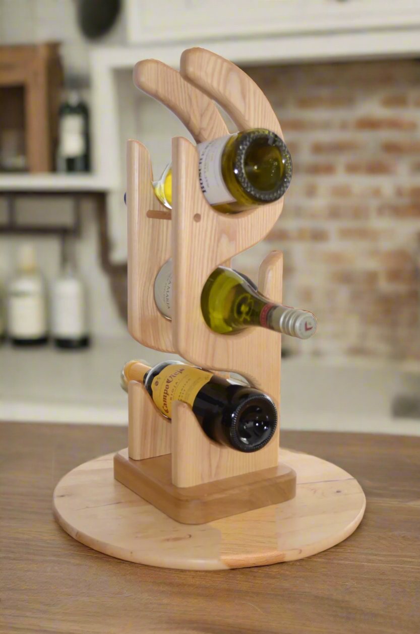 Elegant, stylish free standing wine rack that will hold three wine bottles.